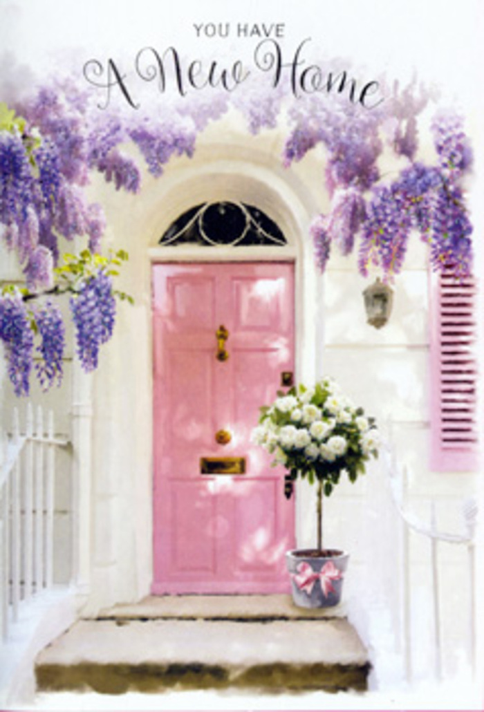 A lovingly detailed Lee doorway is shown as if it were the cover of a housewarming card, rich with subtle colour and meaning. The central pink front door is painted in a soft, milky blush that seems to hold the last glow of early evening sun, standing crisply against matte white walls. Off to one side, a single shutter in the same hue sits part-open, hinting at cosy living spaces filled with unpacked boxes and the promise of new routines. Overhead, wisteria in full bloom cascades down across the lintel, its long strands of lavender and lilac flowers hanging in layered curtains that nearly graze the doorframe. The vines curl and loop like ribbons, weaving an organic archway that might have been growing here since long before the latest occupants moved in from nearby Hither Green. At the doorstep, the eye rests on a grey metal bucket serving as a rustic vase, brimming with creamy white roses. Each rose is fully open, its petals soft and slightly ruffled, as though just arranged by a careful hand from Lee Florist. Sprigs of fresh green foliage peek between the blooms, giving depth and gentle contrast. Tied around the bucket is a satin ribbon in pale pink, its bow offset to one side and its tails lying gracefully across the stone, mirroring the wisteria above. Sunlight filters through the tangled blossoms, scattering dappled patterns across the flowers, door panels, and threshold. The composition feels peaceful yet full of anticipation, like the moment just before guests arrive to see a new place for the first time. It is an image that perfectly suits a new home greeting, sending warmth, congratulations, and a sense of settled happiness to anyone starting afresh in Lee.